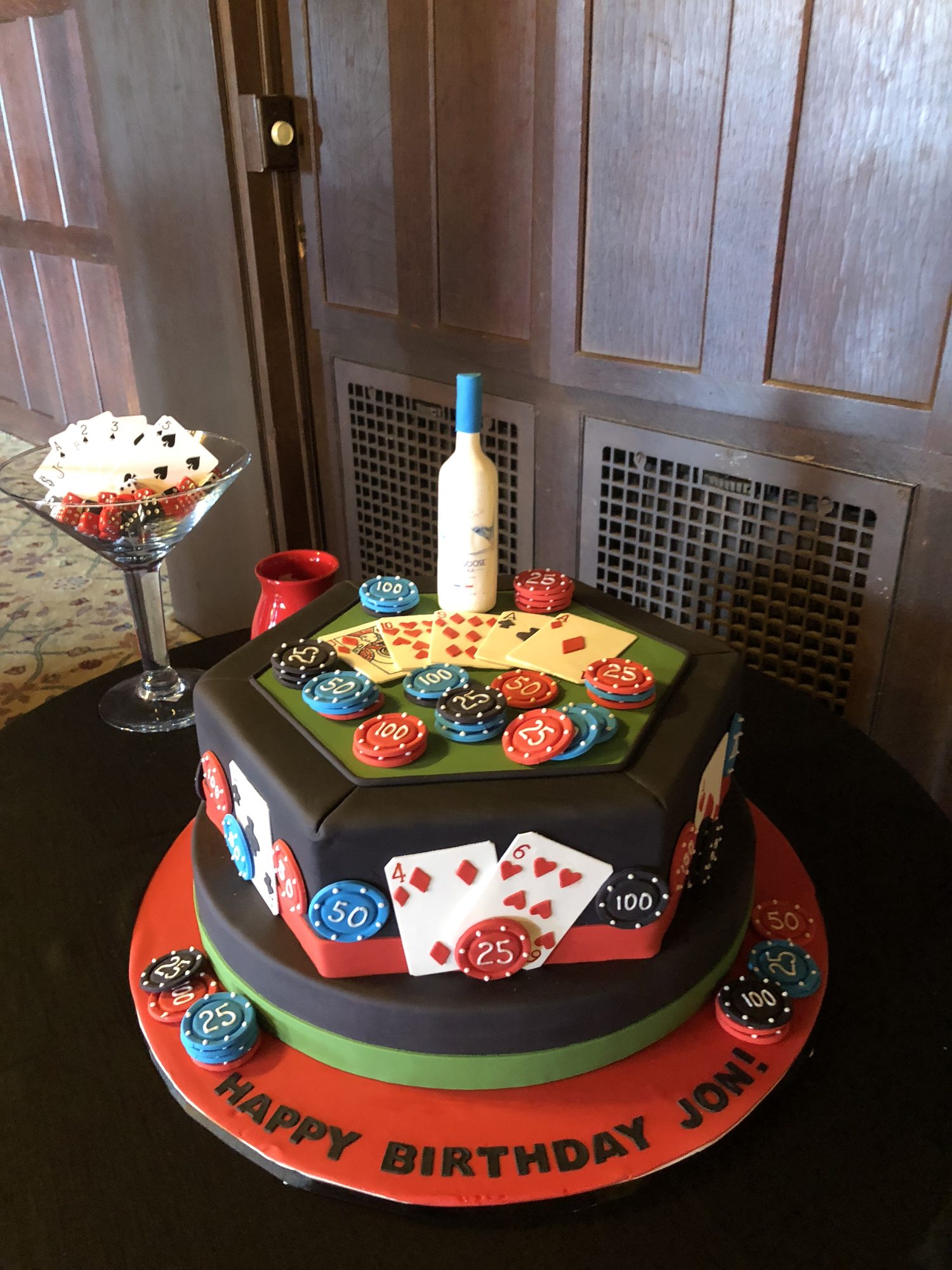 Casino poker table cake with chips and cards